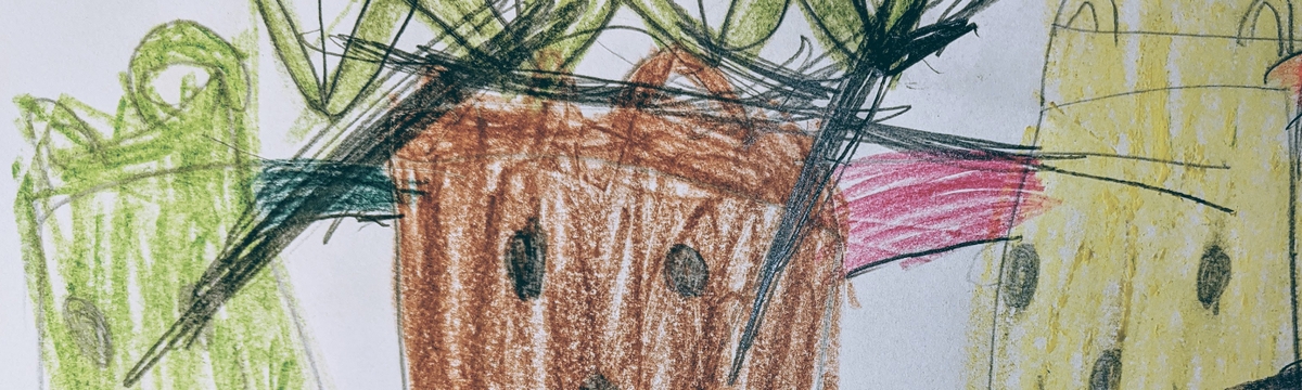 Close-up of a child drawing with four interconnected elements.