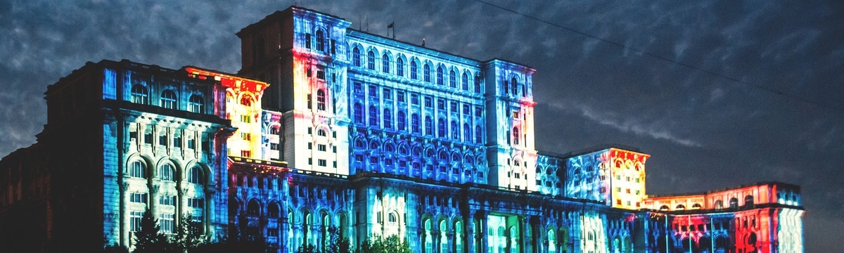 Building illuminated with colourful lights.